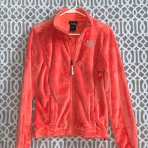 The North Face orange fuzzy jacket